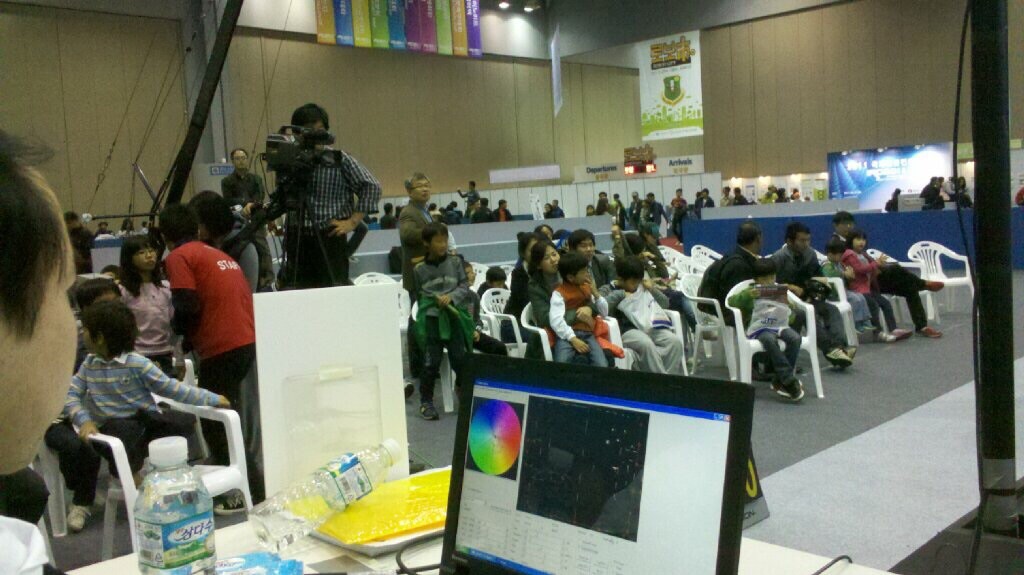 Audience watching the FIRA 2011 robot soccer game